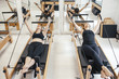 © Lumina/Stocksy - Women Doing Stretching Exercises