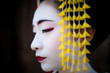 © Paul Ratje/Stocksy - Portrait of woman dressed as geisha in Kyoto, Japan