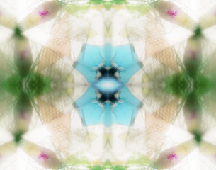 Transparent gemstones seen through kaleidoscope's viewfinder