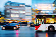 bus in city traffic in motion blur