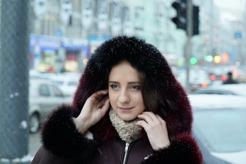 Handsome girl outside the street during winter season