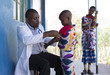 © Hugh Sitton/Stocksy - Doctor working in clinic, Kenya. Africa