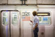 © Fjello/Stocksy - A young latin man in the subway