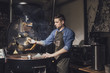 © Lumina/Stocksy - A Man Working at Coffee Production