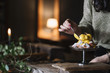 © Alberto Bogo/Stocksy - Female preparing sweet dessert