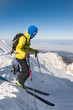 © RG&B Images/Stocksy - Male skier preparing to ride downhill steep slope