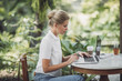 © Lumina/Stocksy - Woman Freelancer Working at Cafe