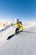 © RG&B Images/Stocksy - Man skiing downhill steep slope with high speed