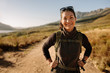 © Jacob Ammentorp Lund/Stocksy - Smiling woman hiker on country walk