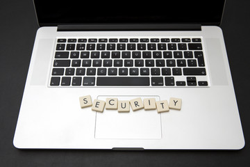 Wall Mural - security text on a modern laptop. information security thread concept image.