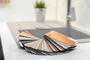 kitchen interior design - furniture material samples on worktop