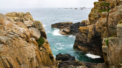 Wall Mural - rocks on shore of Gouffre gulf of English Channel