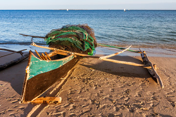 Sticker - Malagasy outrigger canoe beached