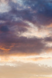 Fototapeta Na sufit - The vertical view of sky background or texture at the sunset time with clouds. Copy space