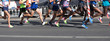 © lzf - marathon runners legs running on city road