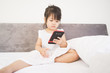 © MIA Studio - Little girl happy look smart phone. asian child.Child development.