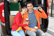 © Africa Studio - Young couple sitting in their car trunk on moving day