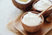 Homemade Organic Coconut Greek Yogurt In Wooden Bowl, Probiotics Food For Gut Health, Keto, Ketogenic Diet,  Dairy Free And  Gluten Free, Healthy Plant Based Vegan Food