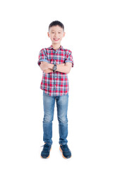 Young asian boy standing and smiling isolated over white background