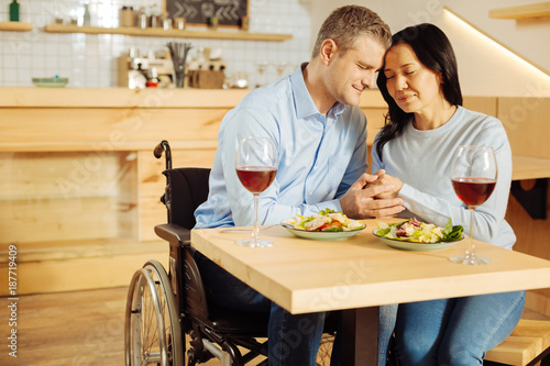 Affection Attractive Delighted Handicapped Man And A Pretty