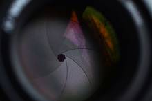 Fragment Of A Portrait Lens For A Modern SLR Camera. A Photograph Of A Wide-aperture Lens With A Focal Length Of 50mm