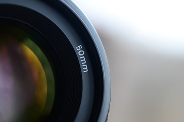 Fragment of a portrait lens for a modern SLR camera. A photograph of a wide-aperture lens with a focal length of 50mm