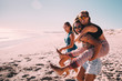 © Criene Images - Happy best friends having good time on the beach together