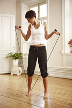 Woman Stretching With Skipping Rope