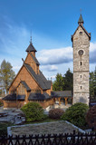 Fototapeta  - Stone tower and the wooden temple Wang, Poland .