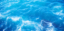 Background Image Of Aqua Sea Water Surface With Sunny Reflections Splitted By Waterline, Aerial View. Ocean Wave Close Up
