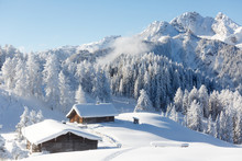 Winter Wonderland In Austrian Alps. Beautiful Winter Scenery With Frozen Trees And Traditional Alpine Hut