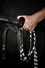 Japanese Sword For Martial Art, Ju-jitsu, Laïdo Or Karate And Black Kimono And Belt