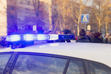 Fototapeta Miasto - police rotation on the car