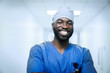 © FS Productions/Blend Images - Portrait of smiling black nurse