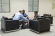 © FS Productions/Blend Images - Doctor and nurses discussing digital tablet
