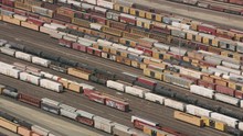 California Circa-2017, Aerial Shot Of Train Cars In Train Yard.  Shot With Cineflex And RED Epic-W Helium. 