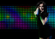 © ASDF - Fashion expressive girl dancing at disco light.