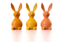 Three Orange Easter Bunny Figures