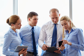 Wall Mural - business team with smartphone at office