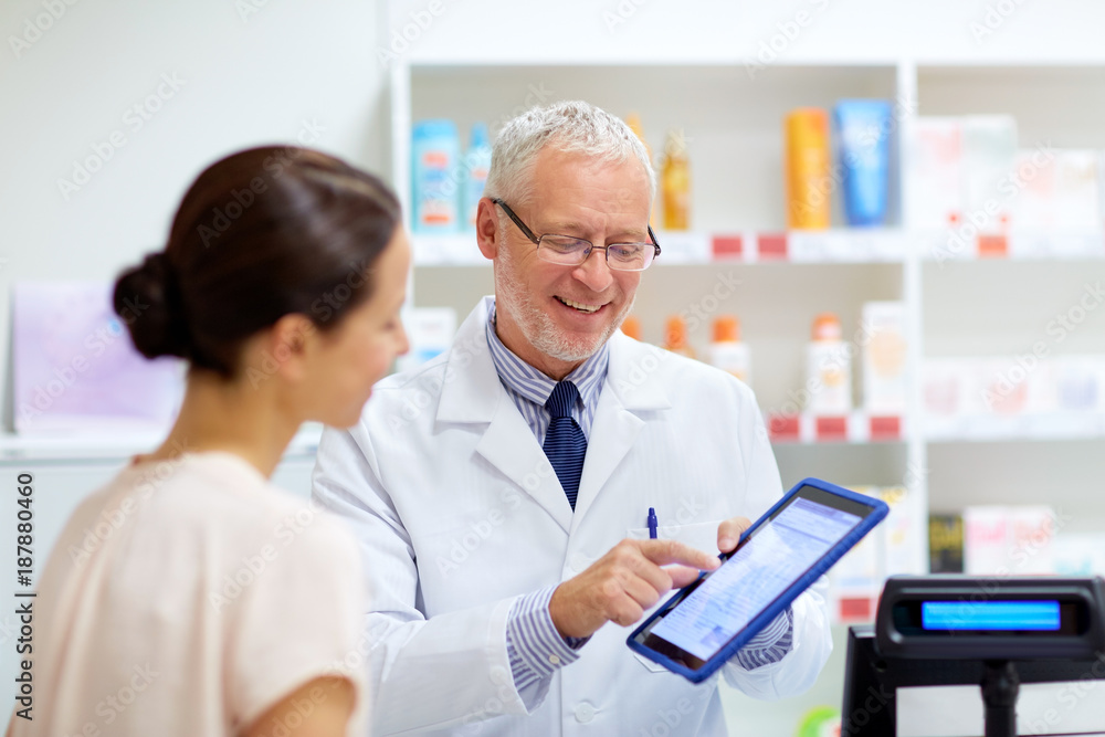 apothecary and customer with tablet pc at pharmacy - obrazy, fototapety, plakaty 
