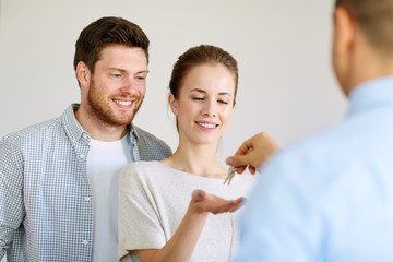 Sticker - realtor giving keys from new home to happy couple