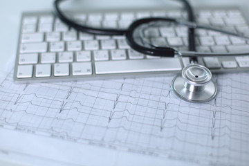 Close up of stethoscope on pc keyboard. Healthcare concept