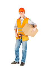 Wall Mural - male builder or manual worker in helmet holding and moving  cardboard box on white background.