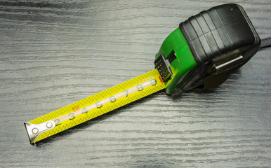 Roller tape measure.