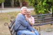 © Africa Studio - Mature couple sitting on bench outdoors