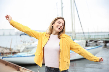 Wall Mural - Beautiful smiling woman outdoors