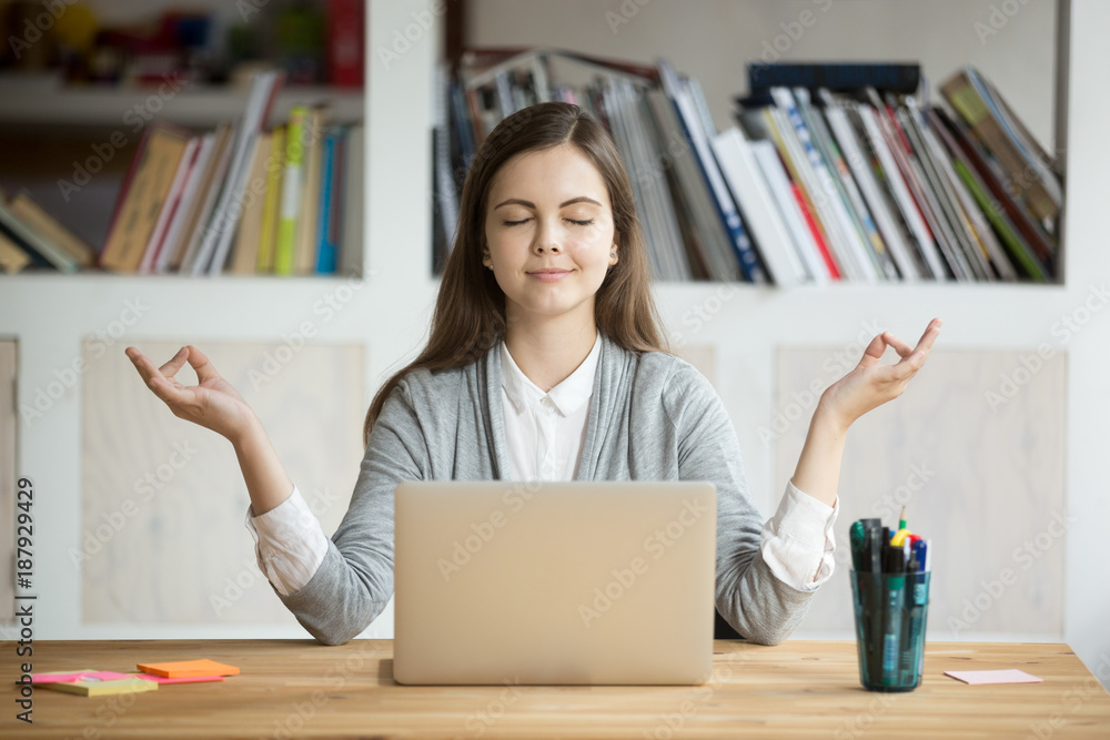 Calm woman relaxing meditating with laptop, no stress free relief at work concept, mindful peaceful young businesswoman or student practicing breathing yoga exercises at workplace, office meditation - obrazy, fototapety, plakaty 