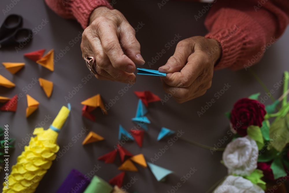 Senior woman doing craft work Stock Photo | Adobe Stock