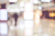 © weedezign - Blurred background,Traveler with baggage at Terminal Departure Check-in at airport with bokeh light,transportation concept.