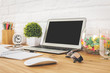 © peshkova - Creative designer desk top with blank laptop